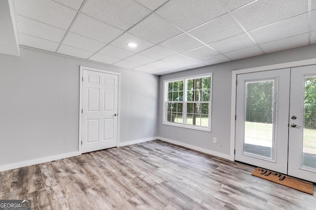 112 Hightower Rd, Hiram, GA 30141 - interior space with wood finished floors, a drop ceiling, and plenty of natural light