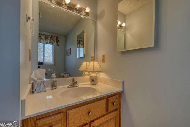 3131 Allison Ct Unit 3A, Young Harris, GA 30582 - bathroom with a textured ceiling and vanity