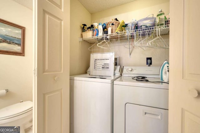 3131 Allison Ct Unit 3A, Young Harris, GA 30582 - laundry room with a textured ceiling, separate washer and dryer, and laundry area