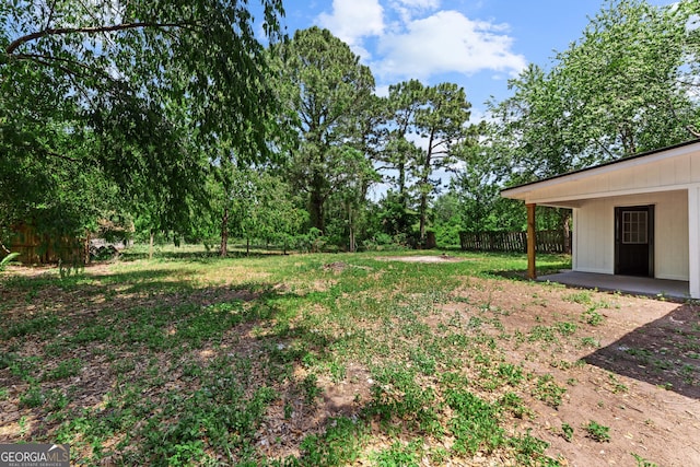 view of yard with fence
