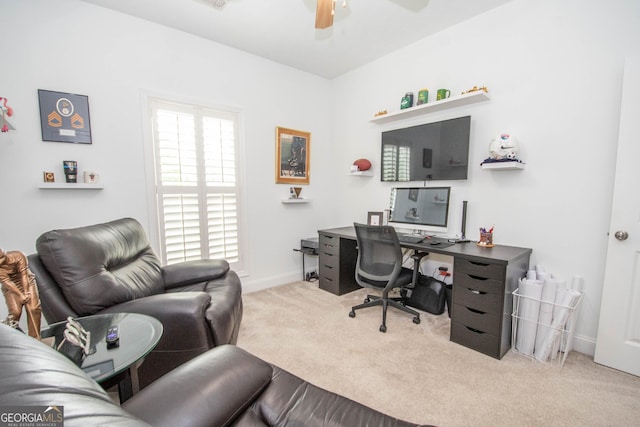 home office featuring a ceiling fan, carpet floors, and baseboards