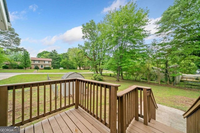 wooden deck with a yard