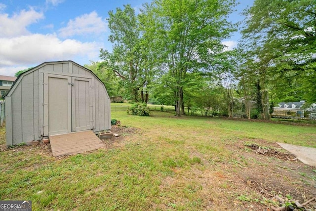 view of yard with a storage unit and an outdoor structure