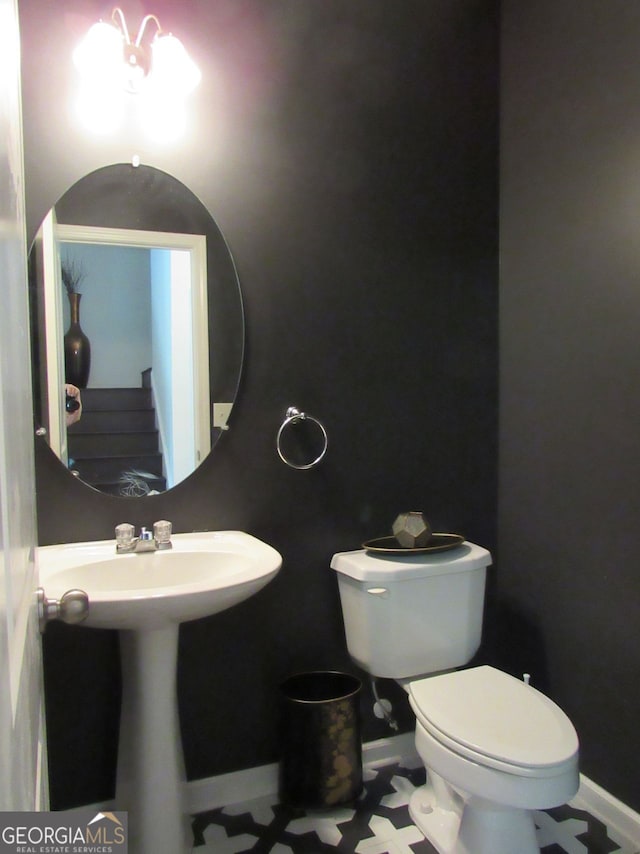 bathroom featuring toilet