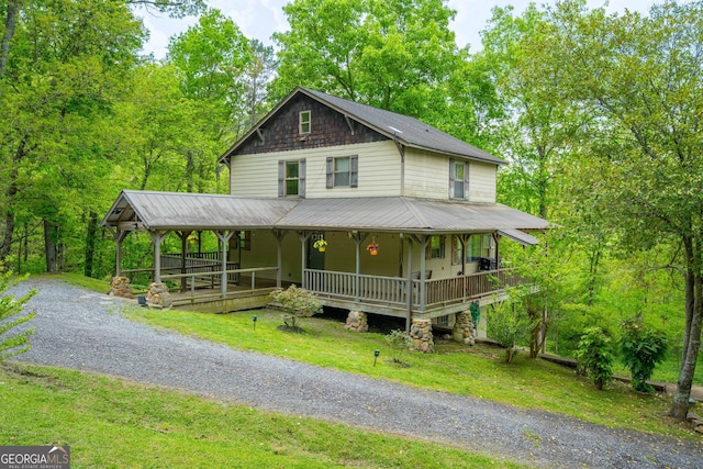 361 Meadow Ln, Talking Rock, GA 30175 - country-style home with a porch, a front lawn, and metal roof