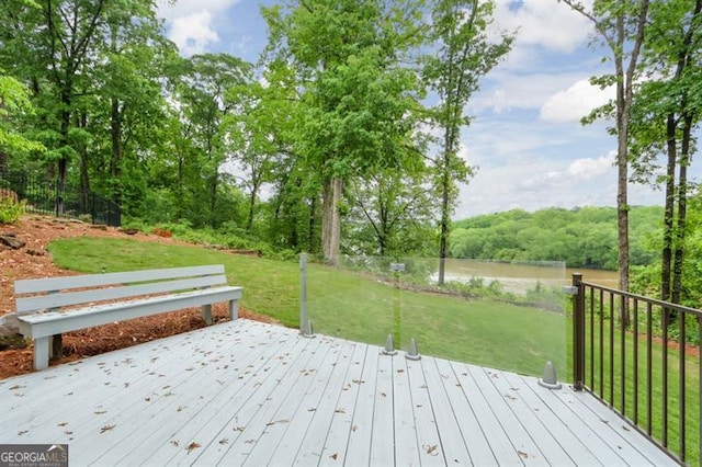 wooden deck with a yard
