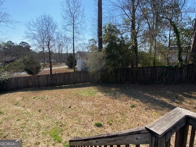 view of yard featuring a fenced backyard