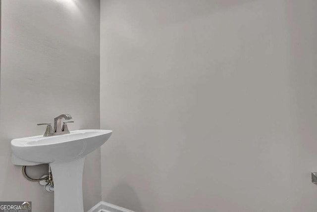 bathroom featuring baseboards