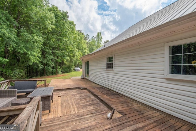 deck with outdoor lounge area