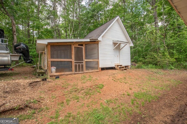 view of poultry coop featuring entry steps