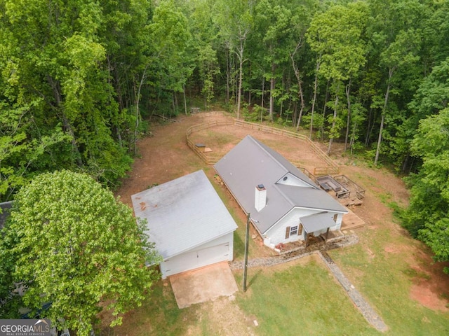 bird's eye view featuring a forest view