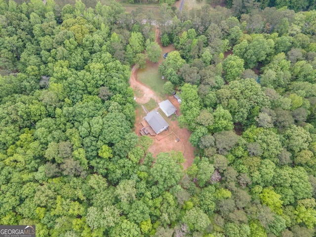 bird's eye view with a view of trees