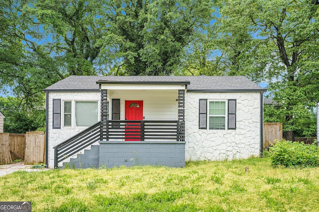 248 Upshaw St SW, Atlanta, GA 30315 - view of front of home featuring a shingled roof and covered porch