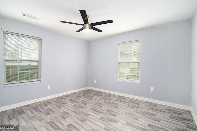 248 Upshaw St SW, Atlanta, GA 30315 - spare room featuring a ceiling fan and light wood-style floors