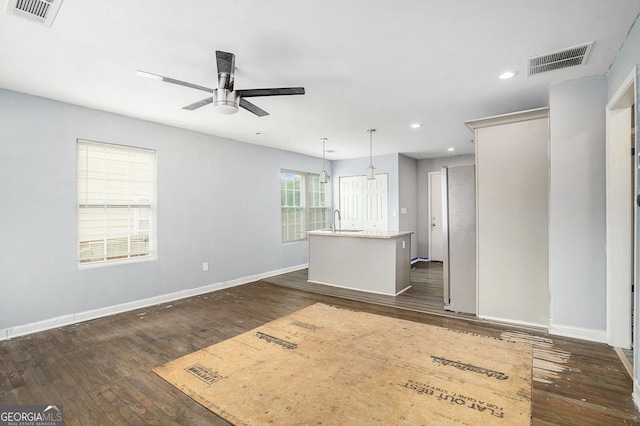 248 Upshaw St SW, Atlanta, GA 30315 - unfurnished living room featuring a ceiling fan, dark wood-type flooring, and recessed lighting