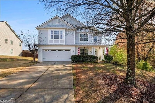 233 Hampton Station Blvd, Canton, GA 30115 - view of front of home with concrete driveway, fence, and a garage