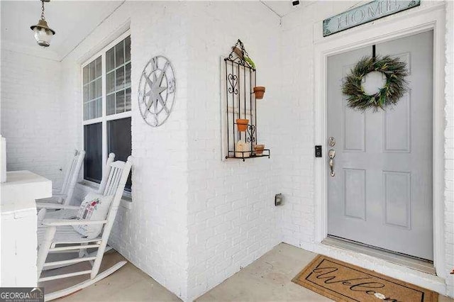 233 Hampton Station Blvd, Canton, GA 30115 - view of exterior entry with a porch