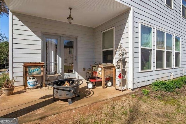 233 Hampton Station Blvd, Canton, GA 30115 - view of patio featuring a fire pit