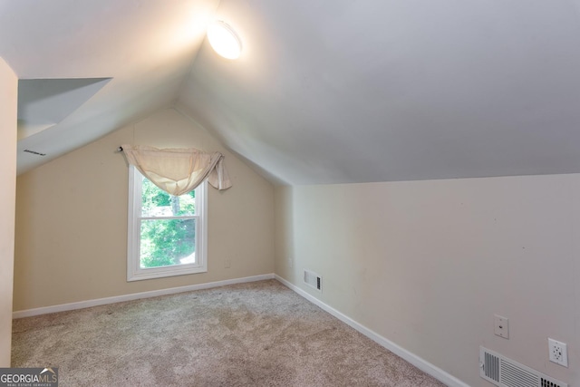 2240 Lake Dr NE, Conyers, GA 30012 - bonus room with vaulted ceiling and carpet flooring