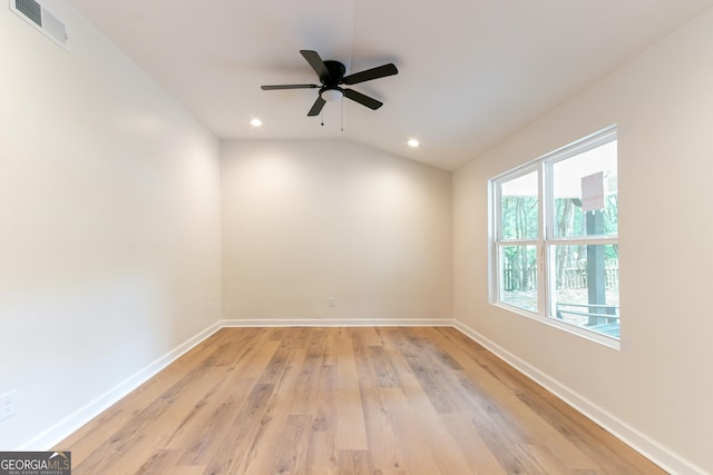 unfurnished room with baseboards, visible vents, light wood-style flooring, and recessed lighting