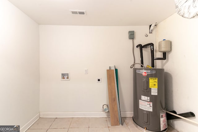 utilities with visible vents and water heater