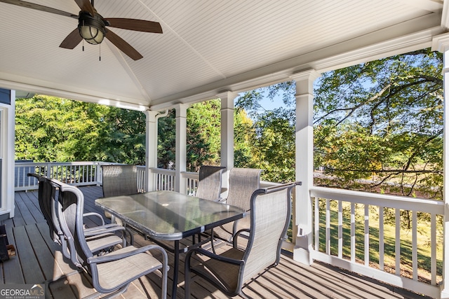 deck featuring outdoor dining space and ceiling fan
