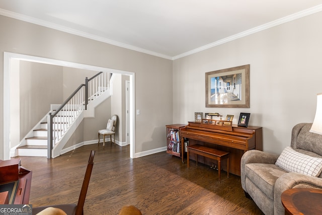 sitting room with ornamental molding, baseboards, stairway, and dark wood finished floors