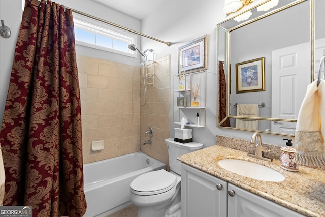 full bath with vanity, toilet, and shower / tub combo with curtain