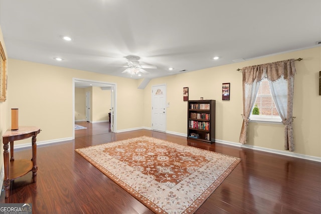 interior space with baseboards, ceiling fan, recessed lighting, and wood finished floors