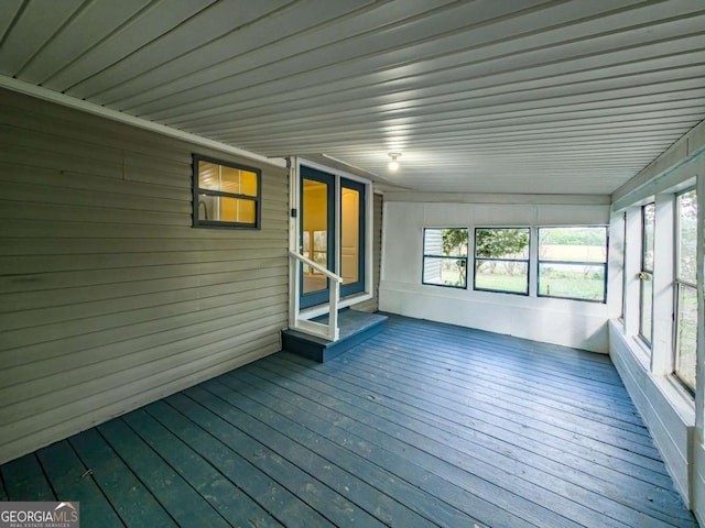 168 Chapman St Unit 1And16, Norman Park, GA 31771 - unfurnished sunroom with a deck, wooden walls, plenty of natural light, and hardwood / wood-style flooring