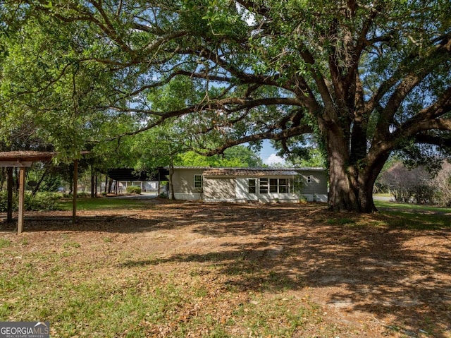 168 Chapman St Unit 1And16, Norman Park, GA 31771 - view of yard featuring a detached carport