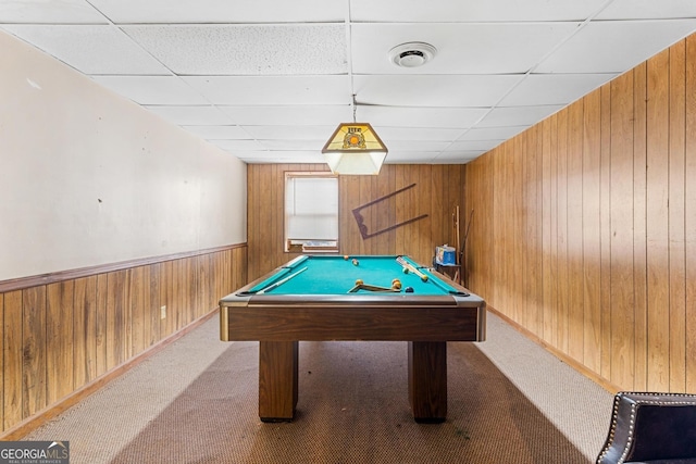 game room featuring a drop ceiling, wood walls, carpet, and pool table