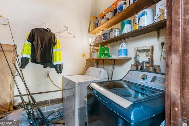washroom with washer and dryer and laundry area