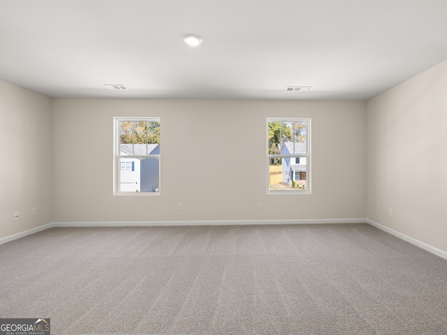 8230 Coldstream Dr, Fairburn, GA 30213 - unfurnished room with healthy amount of natural light and carpet