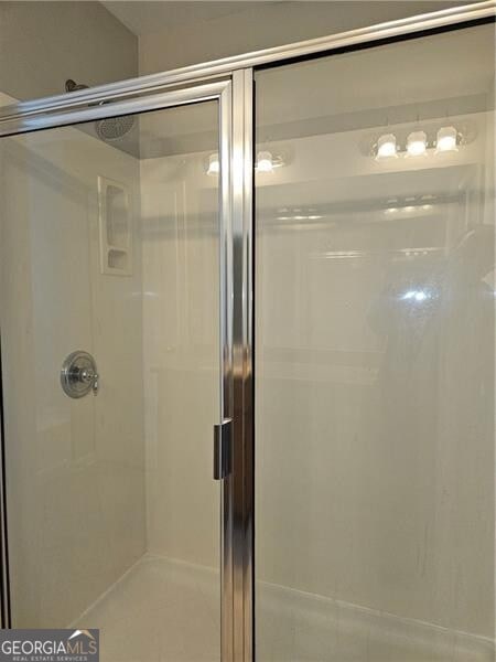 full bath featuring a stall shower