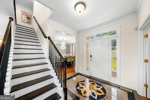 209 Braemar Ct, Mcdonough, GA 30253 - foyer entrance with baseboards, ornamental molding, granite finish floor, and stairs