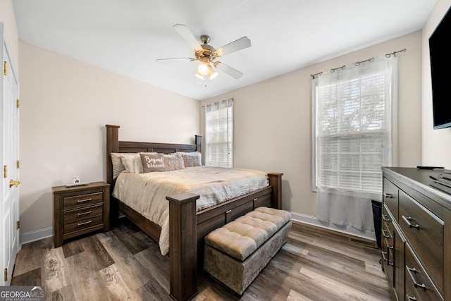 209 Braemar Ct, Mcdonough, GA 30253 - bedroom featuring a ceiling fan, baseboards, and wood finished floors