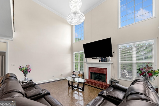 209 Braemar Ct, Mcdonough, GA 30253 - living area with an inviting chandelier, ornamental molding, a fireplace, baseboards, and a high ceiling