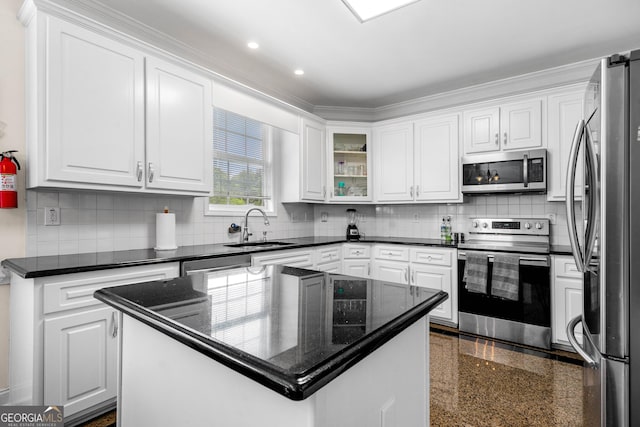 209 Braemar Ct, Mcdonough, GA 30253 - kitchen featuring a sink, white cabinets, and stainless steel appliances