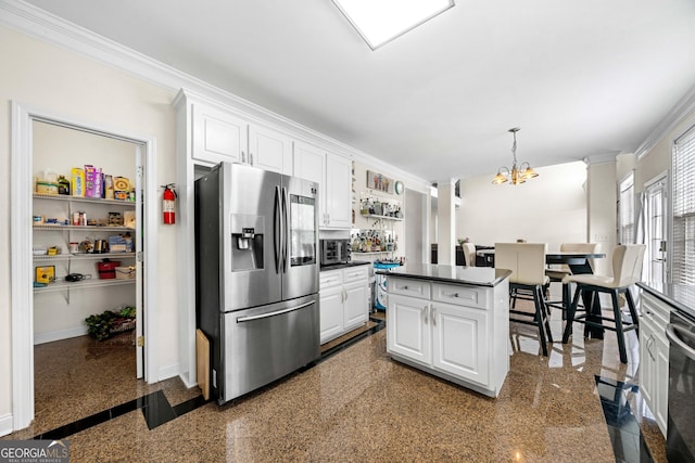 209 Braemar Ct, Mcdonough, GA 30253 - kitchen featuring stainless steel fridge, ornamental molding, white cabinetry, and dark countertops