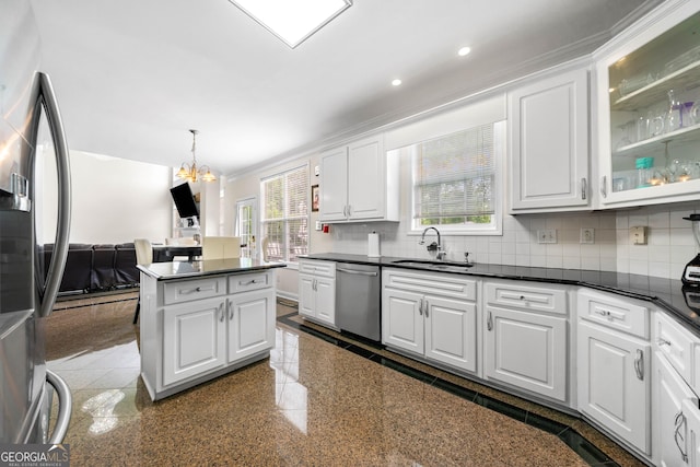 209 Braemar Ct, Mcdonough, GA 30253 - kitchen with white cabinets, dark countertops, appliances with stainless steel finishes, a sink, and granite finish floor