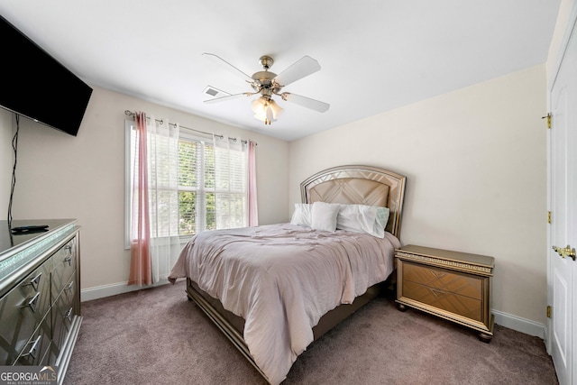 209 Braemar Ct, Mcdonough, GA 30253 - carpeted bedroom with baseboards, visible vents, and ceiling fan