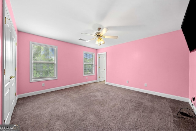 209 Braemar Ct, Mcdonough, GA 30253 - spare room featuring a ceiling fan, baseboards, visible vents, and carpet