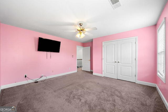 209 Braemar Ct, Mcdonough, GA 30253 - unfurnished bedroom featuring carpet flooring, baseboards, and a closet