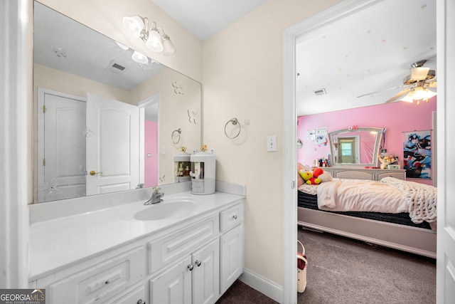 209 Braemar Ct, Mcdonough, GA 30253 - bathroom featuring visible vents, a ceiling fan, connected bathroom, and vanity