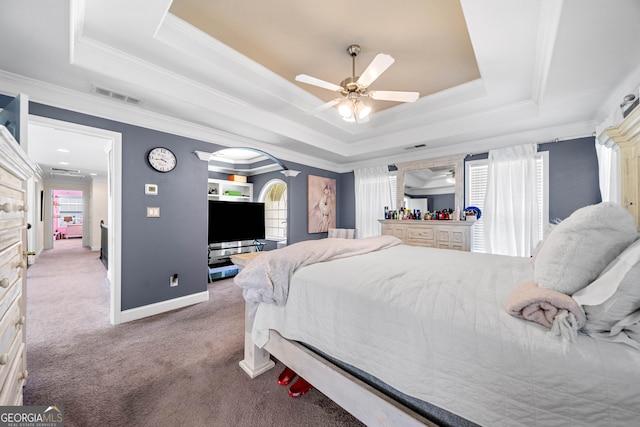 209 Braemar Ct, Mcdonough, GA 30253 - carpeted bedroom featuring crown molding, visible vents, multiple windows, and a raised ceiling