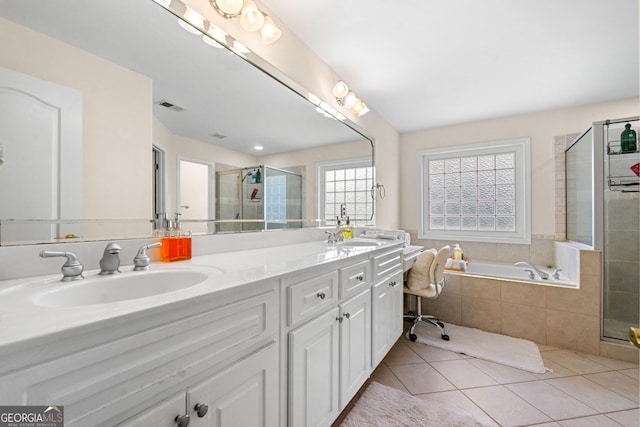 209 Braemar Ct, Mcdonough, GA 30253 - full bathroom with a garden tub, visible vents, tile patterned flooring, a shower stall, and a sink