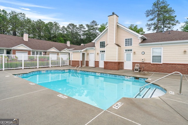 pool featuring fence