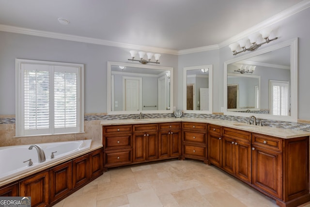 full bath featuring a chandelier, ornamental molding, a garden tub, and double vanity