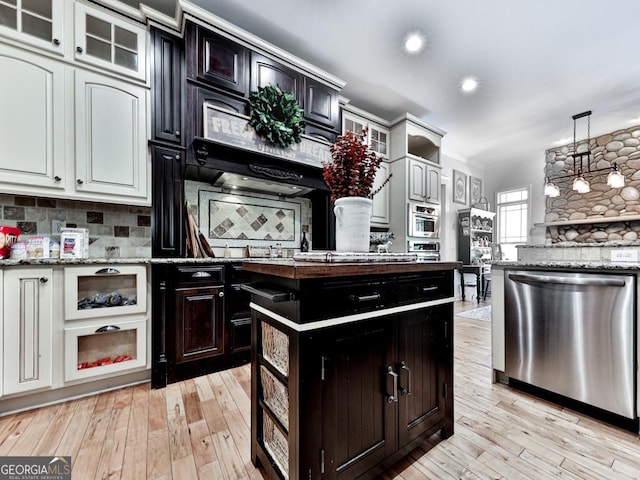 1141 Addington Ln, Waleska, GA 30183 - kitchen with tasteful backsplash, light wood-type flooring, glass insert cabinets, and appliances with stainless steel finishes